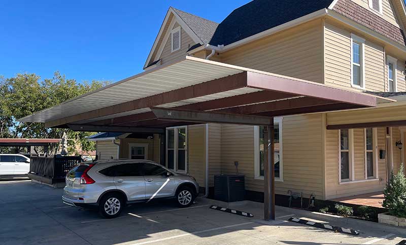 Full cantilever carport at small office
